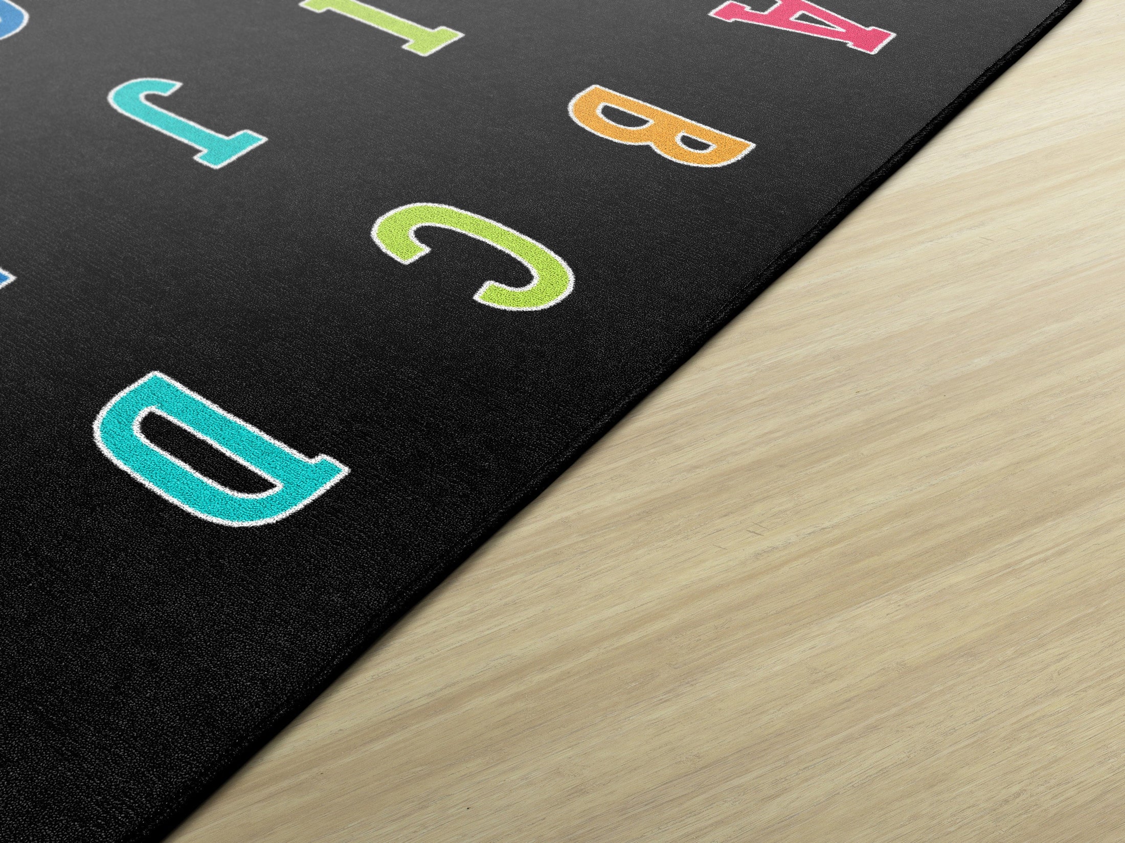 Rainbow Alphabet on Black Sit Spots Rug