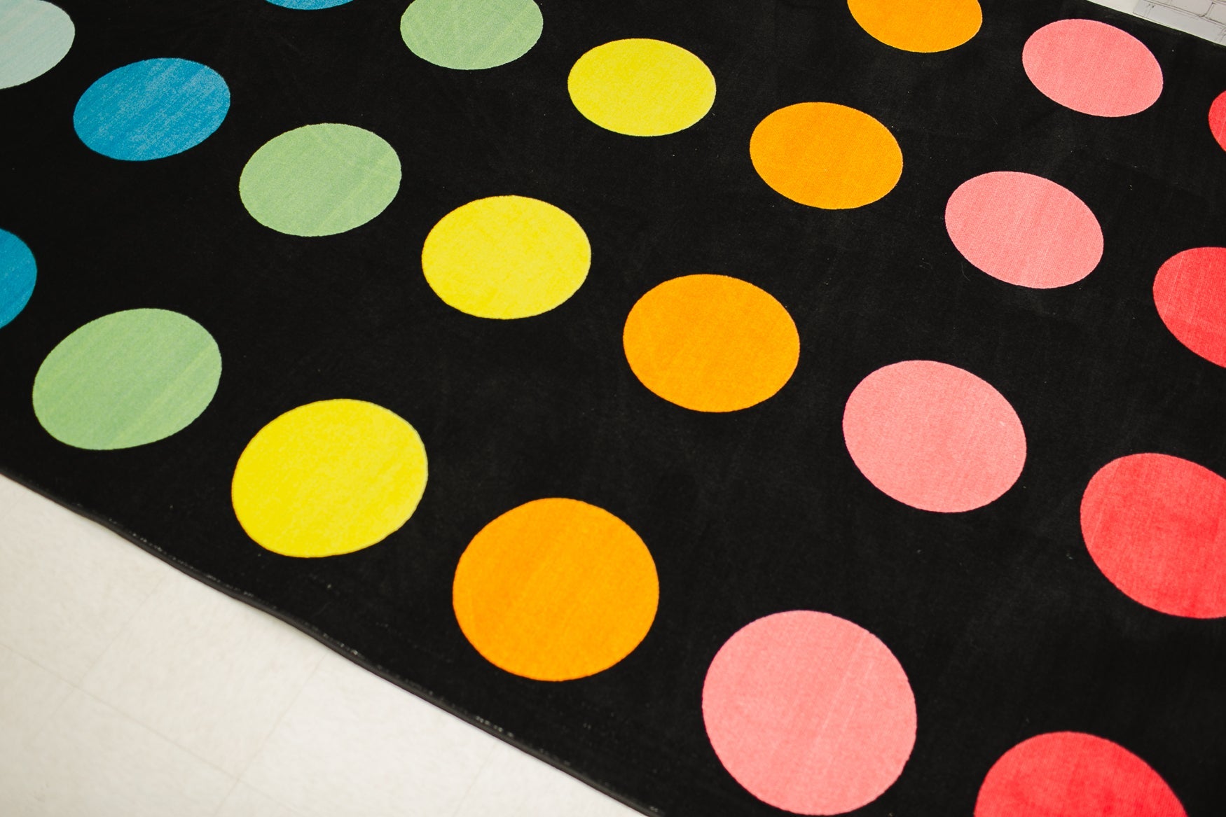 Rainbow Dots on Black Sit Spots Classroom Rug by Schoolgirl Style