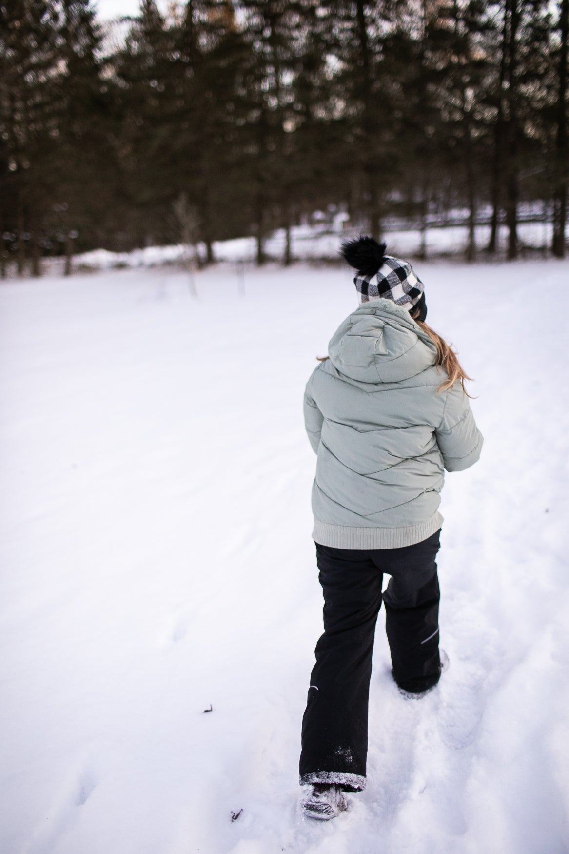 Child going on a winter walk as a brain break activity