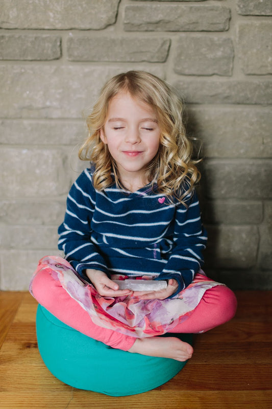 Child practicing mindfulness