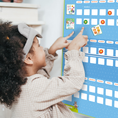 Load image into Gallery viewer, Girl pointing to Magnetic Visual Schedule Board for Kids
