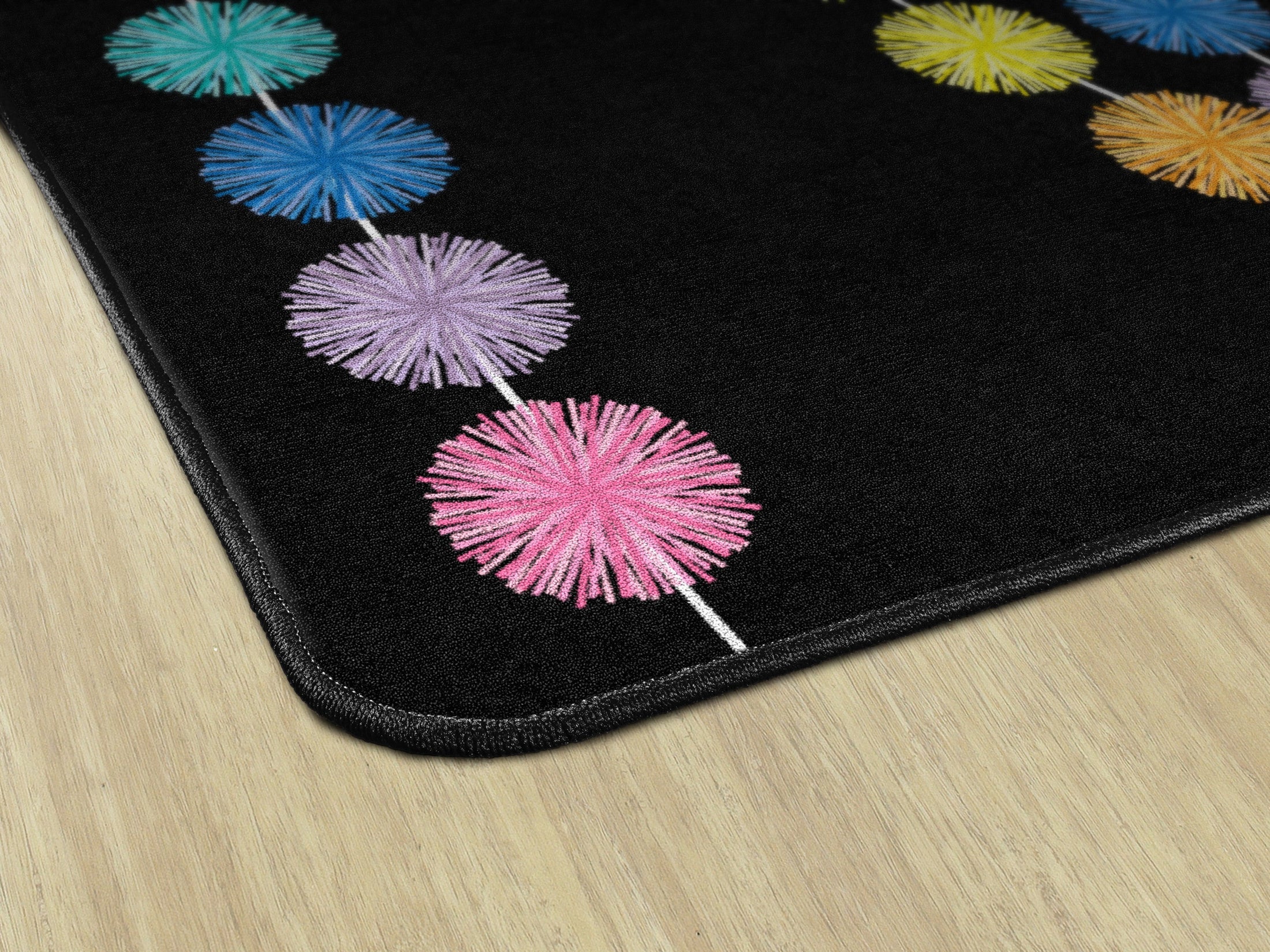 Rainbow Poms on Black Classroom Rug by Schoolgirl Style