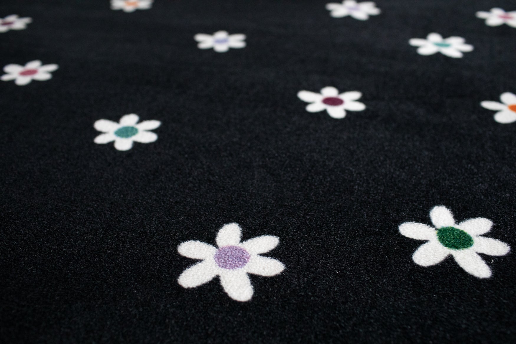 Small Daisies on Black Rug