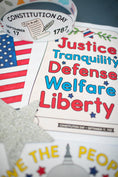 Load image into Gallery viewer, Educational materials celebrating Constitution Day with text and American flag.
