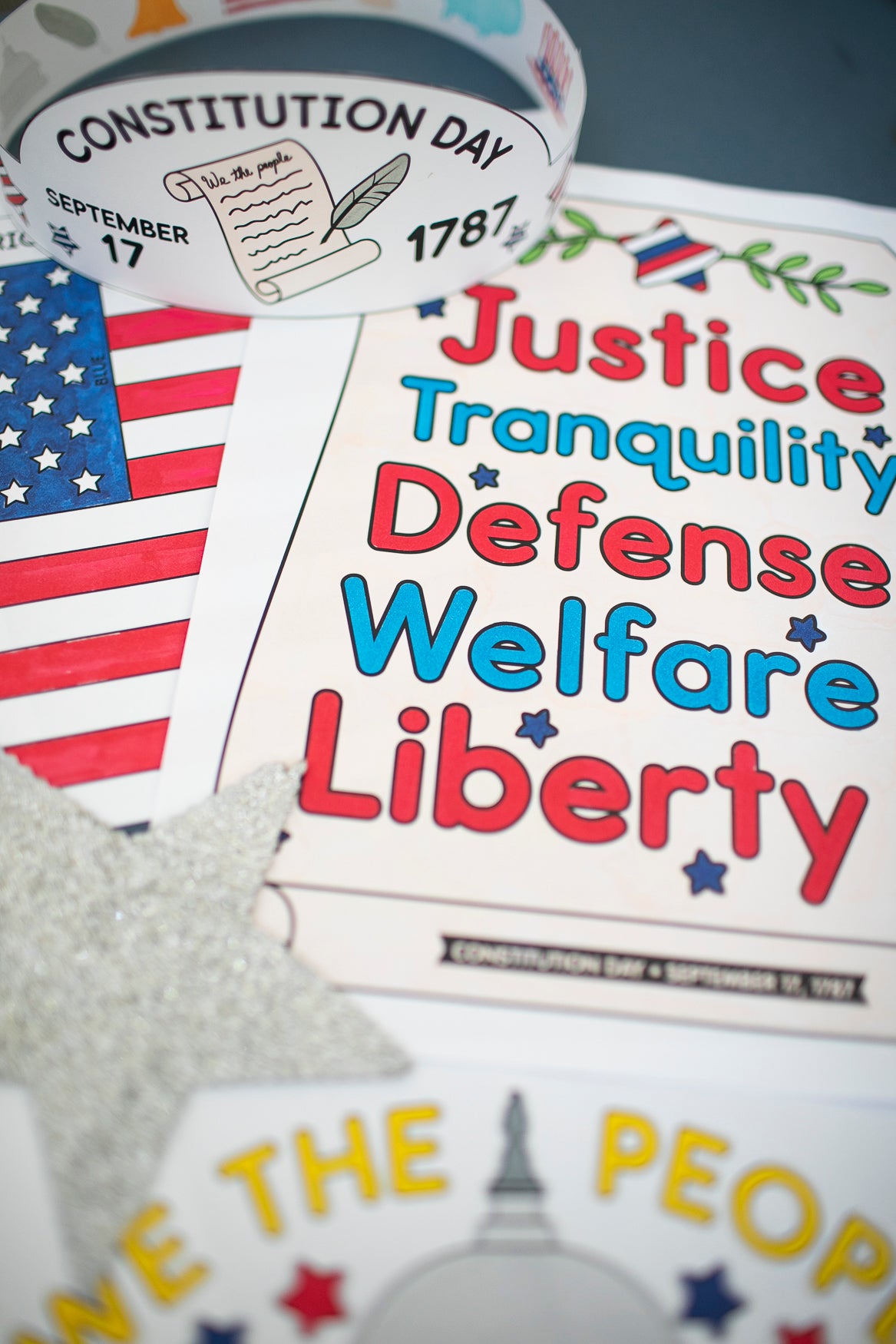Educational materials celebrating Constitution Day with text and American flag.